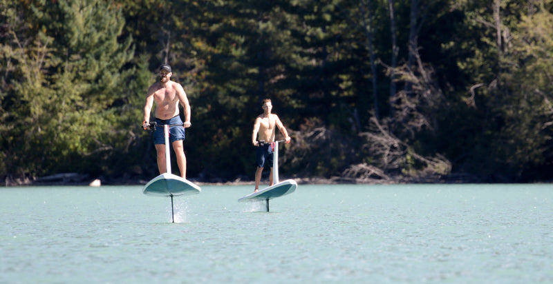 Two riders on Hydroflyer boards